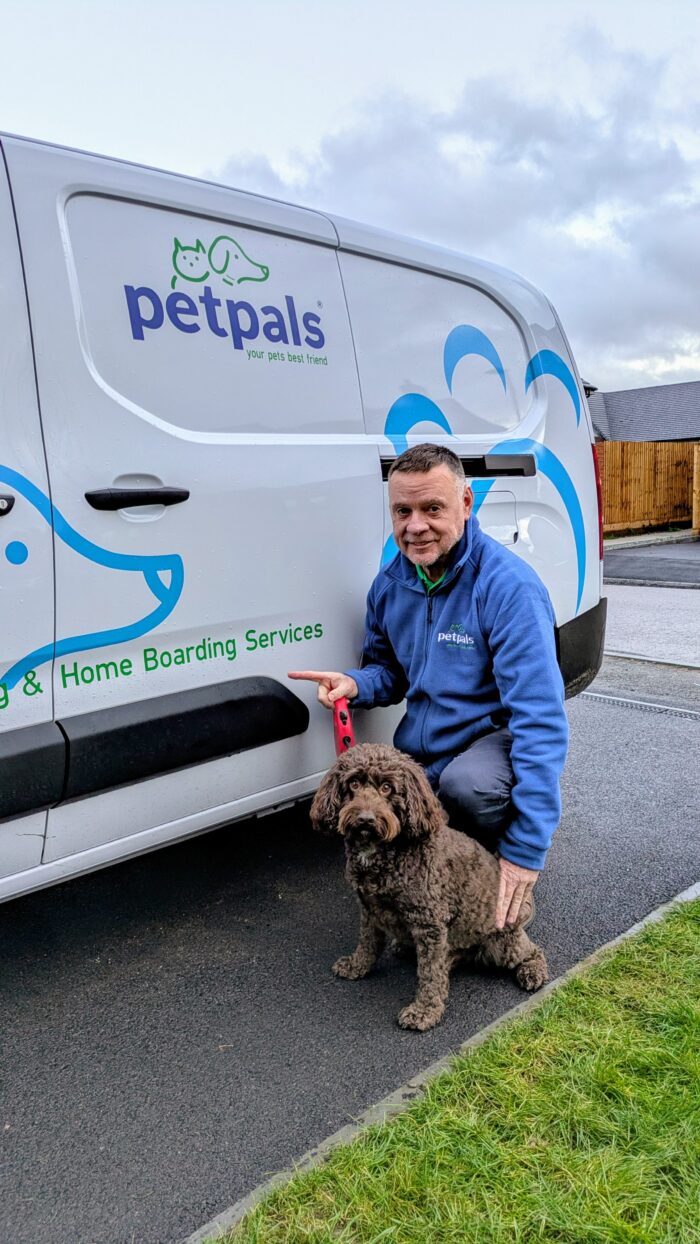 Andy owner of Petpals Halesowen with his beloved Cockapoo Marley.